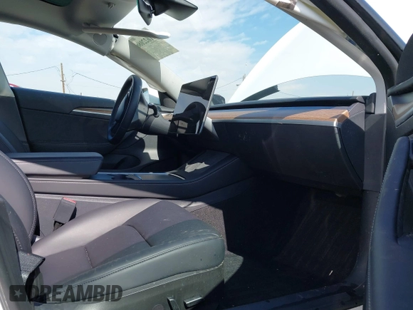 2023 Tesla Model 3 with VIN 5YJ3E1EA9PF640015, listed as a IAAI auction lot 41622086 with 15,622 mi miles and . Bid and sale history available at carsss.com. Image 5.