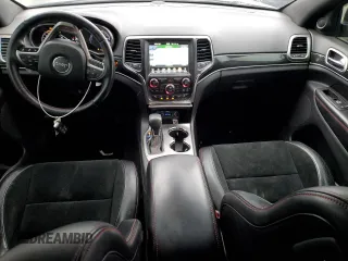 2017 Jeep Grand Cherokee Trailhawk with VIN 1C4RJFLT5HC692439, listed as a Copart auction lot 81093534 with 135,493 mi miles and Salvage title. Bid and sale history available at DreamBid. Image 8.