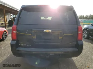 2015 Chevrolet Suburban LT with VIN 1GNSKJKC5FR297522, listed as a Copart auction lot 49248575 with 265,876 mi miles and Clean Title. Bid and sale history available at carsss.com. Image 6.