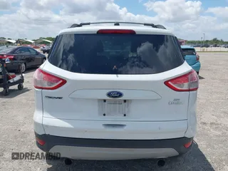 2013 Ford Escape SE with VIN 1FMCU0GX0DUC79223, listed as a IAAI auction lot 42077240 with 158,141 mi miles and . Bid and sale history available at DreamBid. Image 16.