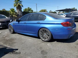2016 BMW M5 with VIN WBSFV9C57GG343387, listed as a Copart auction lot 73416564 with 71,131 mi miles and Salvage Title. Bid and sale history available at carsss.com. Image 2.