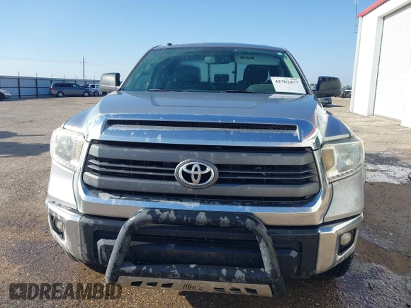 2014 Toyota Tundra SR with VIN 5TFRM5F13EX078411, listed as a IAAI auction lot 42702477 with 123,336 mi miles and . Bid and sale history available at DreamBid. Image 12.