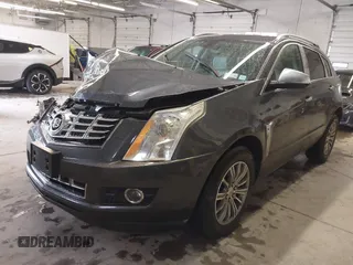 2013 Cadillac SRX Performance Collection with VIN 3GYFNHE37DS530908, listed as a IAAI auction lot 41662796 with 80,254 mi miles. Bid and sale history available at carsss.com. Image 2.
