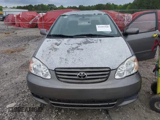 2003 Toyota Corolla CE with VIN 1NXBR32EX3Z037333, listed as a IAAI auction lot 42103368 with 205,925 mi miles and . Bid and sale history available at DreamBid. Image 6.