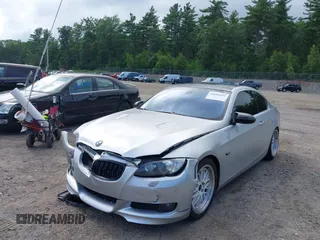 2007 BMW 3 Series 328xi with VIN WBAWC33587PC86076, listed as a IAAI auction lot 42695543 with 158,141 mi miles and . Bid and sale history available at DreamBid. Image 2.
