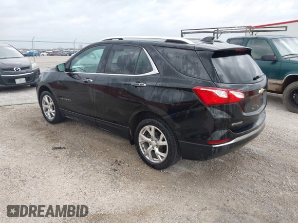 2018 Chevrolet Equinox Premier with VIN 2GNAXVEV7J6275379, listed as a IAAI auction lot 41949962 with 149,329 mi miles and . Bid and sale history available at DreamBid. Image 3.