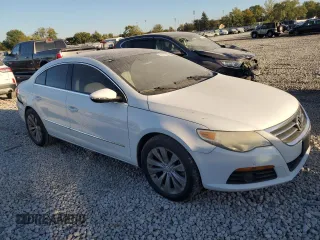 2010 Volkswagen CC with VIN WVWHN9AN6AE532487, listed as a Copart auction lot 74472224 with 119,629 mi miles and Salvage Title. Bid and sale history available at DreamBid. Image 4.