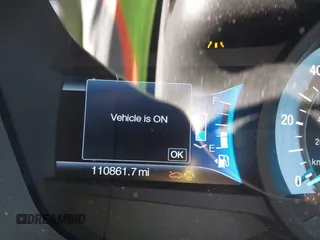 2016 Ford Fusion Titanium Hybrid with VIN 3FA6P0RU8GR127140, listed as a IAAI auction lot 41750405 with 110,861 mi miles. Bid and sale history available at carsss.com. Image 16.