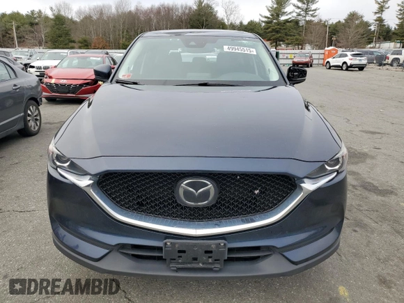 2018 Mazda CX-5 Touring with VIN JM3KFBCM9J0433729, listed as a Copart auction lot 49945515 with 143,064 mi miles and Salvage Title. Bid and sale history available at carsss.com. Image 5.