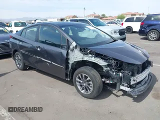 2020 Toyota Prius L Eco z VIN JTDKARFU2L3116050, wystawiony jako IAAI lot #42229065 z przebiegiem 31 032 mil mil oraz . Historia ofert i sprzedaży dostępna na DreamBid. Obrazek 1.
