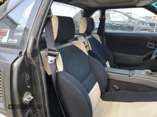 1986 Toyota MR2 z VIN JT2AW15C6G0075929, wystawiony jako Copart lot #68167924 z przebiegiem 123 975 mil mil oraz Tytuł czysty. Historia ofert i sprzedaży dostępna na DreamBid. Obrazek 10.