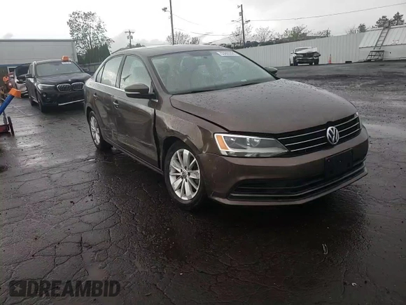 2015 Volkswagen Jetta SE z VIN 3VWD17AJ1FM422960, wystawiony jako Copart lot #55860335 z przebiegiem 87 616 mil mil oraz Czysty tytuł • Clean title. Historia ofert i sprzedaży dostępna na DreamBid. Obrazek 13.