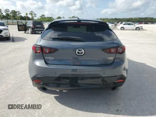 2021 Mazda 3 Premium Plus with VIN JM1BPBNYXM1403126, listed as a Copart auction lot 59971535 with 56,952 mi miles and Salvage title. Bid and sale history available at DreamBid. Image 6.