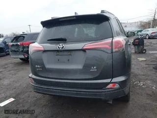 2018 Toyota RAV4 LE with VIN JTMBFREV0JJ223957, listed as a IAAI auction lot 41652810 with 144,629 mi miles. Bid and sale history available at carsss.com. Image 16.