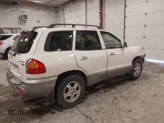 2003 Hyundai Santa Fe GLS with VIN KM8SC13E83U533400, listed as a IAAI auction lot 41610045 with 98,196 mi miles. Bid and sale history available at carsss.com. Image 4.