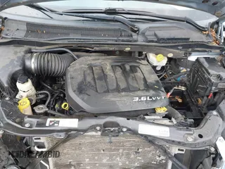 2013 Chrysler Town & Country Limited with VIN 2C4RC1GG5DR571731, listed as a IAAI auction lot 42028807 with 155,875 mi miles. Bid and sale history available at carsss.com. Image 10.