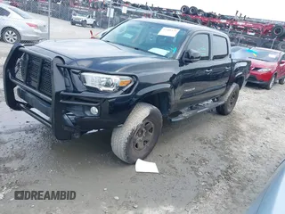 2016 Toyota Tacoma SR5 z VIN 5TFAZ5CN6GX012718, wystawiony jako IAAI lot #42408153 z przebiegiem 136 571 mil mil oraz . Historia ofert i sprzedaży dostępna na DreamBid. Obrazek 17.