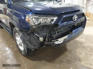 2019 Toyota 4Runner SR5 with VIN JTEBU5JR3K5649591, listed as a IAAI auction lot 41674778 with 67,301 mi miles. Bid and sale history available at carsss.com. Image 6.