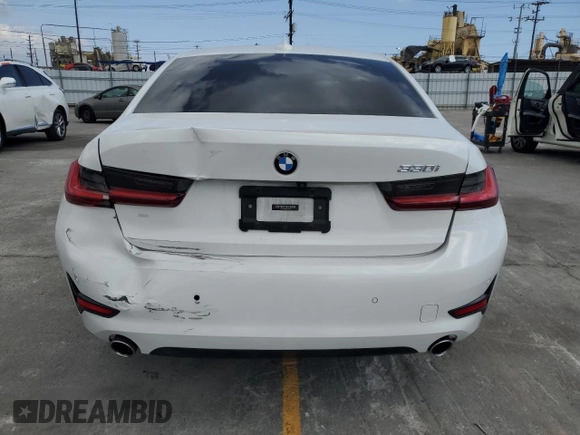 2022 BMW 3 Series 330i with VIN 3MW5R1J08N8C23042, listed as a Copart auction lot 56992485 with 43,693 mi miles and Salvage title. Bid and sale history available at DreamBid. Image 6.