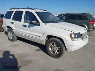 2004 Jeep Grand Cherokee Laredo with VIN 1J4GX48S84C206933, listed as a IAAI auction lot 41739364 with 257,893 mi miles. Bid and sale history available at carsss.com. Image 1.