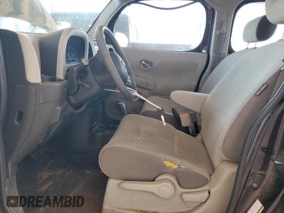 2009 Nissan Cube SL z VIN JN8AZ28R09T104285, wystawiony jako Copart lot #74860344 z przebiegiem 172 153 mil mil oraz Czysty tytuł • Clean title. Historia ofert i sprzedaży dostępna na DreamBid. Obrazek 7.