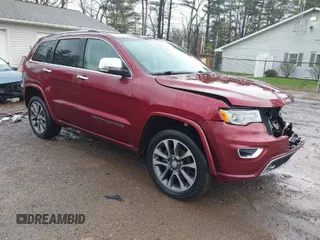 2017 Jeep Grand Cherokee Overland with VIN 1C4RJFCG5HC854024, listed as a IAAI auction lot 42006307 with 118,640 mi miles. Bid and sale history available at carsss.com. Image 1.