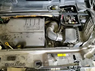 2018 Land Rover Discovery z VIN SALCT2RX4JH727864, wystawiony jako Copart lot #89148855 z przebiegiem 124 853 mil mil oraz Szkoda całkowita • Salvage title. Historia ofert i sprzedaży dostępna na DreamBid. Obrazek 15.