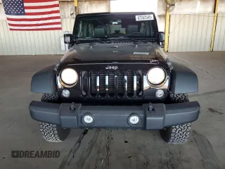 2015 Jeep Wrangler Unlimited Rubicon Hard Rock with VIN 1C4HJWFG1FL532288, listed as a Copart auction lot 62262545 with 91,807 mi miles and Salvage title. Bid and sale history available at DreamBid. Image 5.