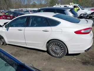 2013 Ford Fusion Titanium with VIN 3FA6P0K9XDR102242, listed as a IAAI auction lot 41850893 with 161,186 mi miles. Bid and sale history available at carsss.com. Image 14.