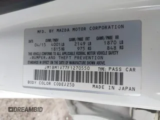 2015 Mazda 3 i Touring with VIN JM1BM1V77F1270550, listed as a IAAI auction lot 41497822 with 157,722 mi miles and . Bid and sale history available at DreamBid. Image 9.