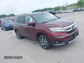 2021 Honda Pilot Elite with VIN 5FNYF6H02MB042122, listed as a IAAI auction lot 42337231 with 53,410 mi miles and . Bid and sale history available at DreamBid. Image 1.