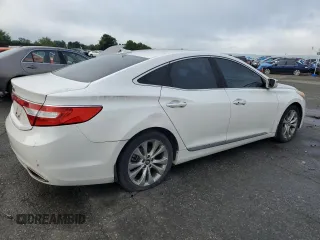 2013 Hyundai Azera с VIN KMHFG4JG8DA228669, выставлен на аукционе Copart как лот 62734185 с пробегом 148 611 миль миль и Чистый • Clean title. История ставок и продаж доступна на DreamBid. Изображение 3.