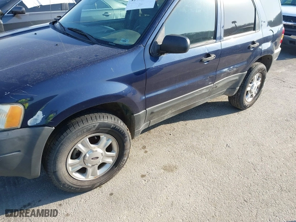 2003 Ford Escape XLT Popular 2 with VIN 1FMYU93103KE17610, listed as a IAAI auction lot 41766806 with 1 mi miles. Bid and sale history available at carsss.com. Image 12.
