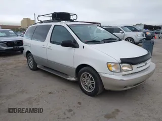 1999 Toyota Sienna LE with VIN 4T3ZF13C2XU105212, listed as a IAAI auction lot 42066557 with 153,659 mi miles. Bid and sale history available at carsss.com. Image 1.