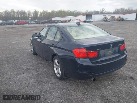 2015 BMW 3 Series 320i xDrive with VIN WBA3C3G5XFNT51305, listed as a IAAI auction lot 42023280 with 127,887 mi miles and . Bid and sale history available at DreamBid. Image 3.