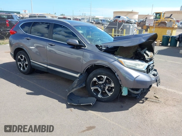 2018 Honda CR-V Touring with VIN 7FARW1H90JE030766, listed as a IAAI auction lot 41637900 with Not Provided miles and . Bid and sale history available at DreamBid. Image 1.