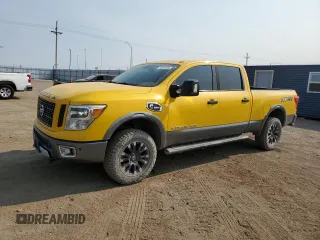 2016 Nissan Titan XD PRO-4X with VIN 1N6BA1F43GN506115, listed as a Copart auction lot 74916444 with 157,268 mi miles and Salvage Title. Bid and sale history available at carsss.com. Image 1.