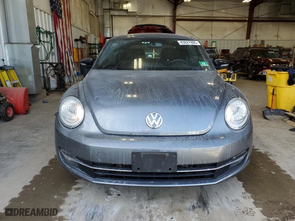 2012 Volkswagen Beetle 2.0T Turbo PZEV with VIN 3VWVA7AT1CM656081, listed as a Copart auction lot 43027995 with 63,802 mi miles and Clean Title. Bid and sale history available at carsss.com. Image 5.