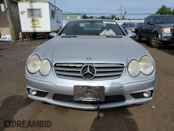 2005 Mercedes-Benz SL z VIN WDBSK79F05F094158, wystawiony jako Copart lot #60888905 z przebiegiem Nie podano mil oraz Szkoda całkowita • Salvage title. Historia ofert i sprzedaży dostępna na DreamBid. Obrazek 5.