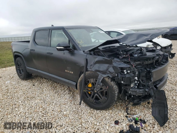 2022 Rivian R1T Adventure z VIN 7FCTGAAA5NN015734, wystawiony jako Copart lot #44019715 z przebiegiem 27 542 mil mil oraz Szkody całkowita. Historia ofert i sprzedaży dostępna na DreamBid. Obrazek 4.