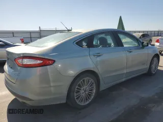 2014 Ford Fusion SE Hybrid with VIN 3FA6P0LUXER164566, listed as a Copart auction lot 64900635 with 181,728 mi miles and Clean title. Bid and sale history available at DreamBid. Image 3.