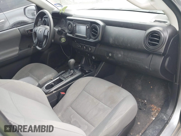 2017 Toyota Tacoma SR with VIN 5TFAX5GN6HX083614, listed as a IAAI auction lot 42314254 with 104,407 mi miles and . Bid and sale history available at DreamBid. Image 5.
