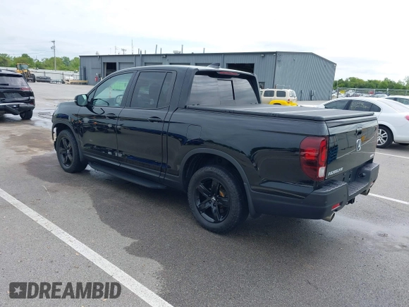 2023 Honda Ridgeline Black Edition with VIN 5FPYK3F86PB015746, listed as a IAAI auction lot 42311862 with 40,181 mi miles and . Bid and sale history available at DreamBid. Image 3.