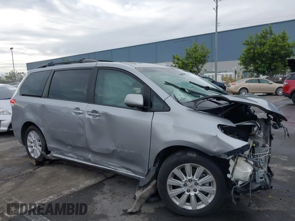 2012 Toyota Sienna XLE with VIN 5TDDK3DC9CS042847, listed as a IAAI auction lot 40970090 with 101,813 mi miles. Bid and sale history available at carsss.com. Image 19.