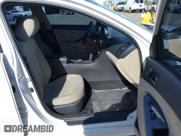2014 Kia Optima LX with VIN 5XXGM4A70EG307809, listed as a IAAI auction lot 42023169 with 127,617 mi miles. Bid and sale history available at carsss.com. Image 5.