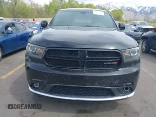 2015 Dodge Durango SXT with VIN 1C4RDJAGXFC796034, listed as a IAAI auction lot 42057983 with 159,108 mi miles and . Bid and sale history available at DreamBid. Image 12.