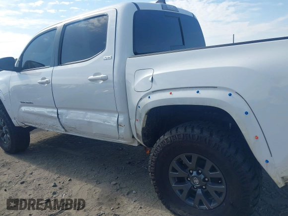 2023 Toyota Tacoma SR with VIN 3TYCZ5AN2PT112854, listed as a IAAI auction lot 42220025 with 43,657 mi miles and . Bid and sale history available at DreamBid. Image 22.