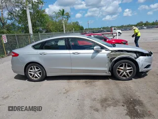 2014 Ford Fusion SE with VIN 3FA6P0H76ER221834, listed as a IAAI auction lot 42079191 with 167,080 mi miles and . Bid and sale history available at carsss.com. Image 13.