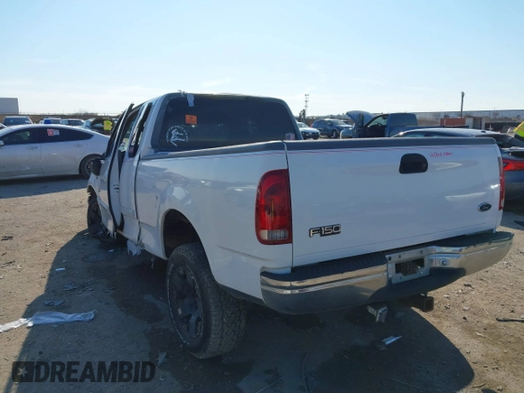 1999 Ford F-150 XL with VIN 1FTRX17L0XKB96416, listed as a IAAI auction lot 41333031 with Not Provided miles. Bid and sale history available at carsss.com. Image 3.