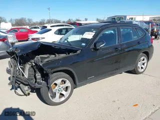 2015 BMW X1 sDrive28i with VIN WBAVM1C58FV498559, listed as a IAAI auction lot 41208638 with 100,452 mi miles. Bid and sale history available at carsss.com. Image 17.